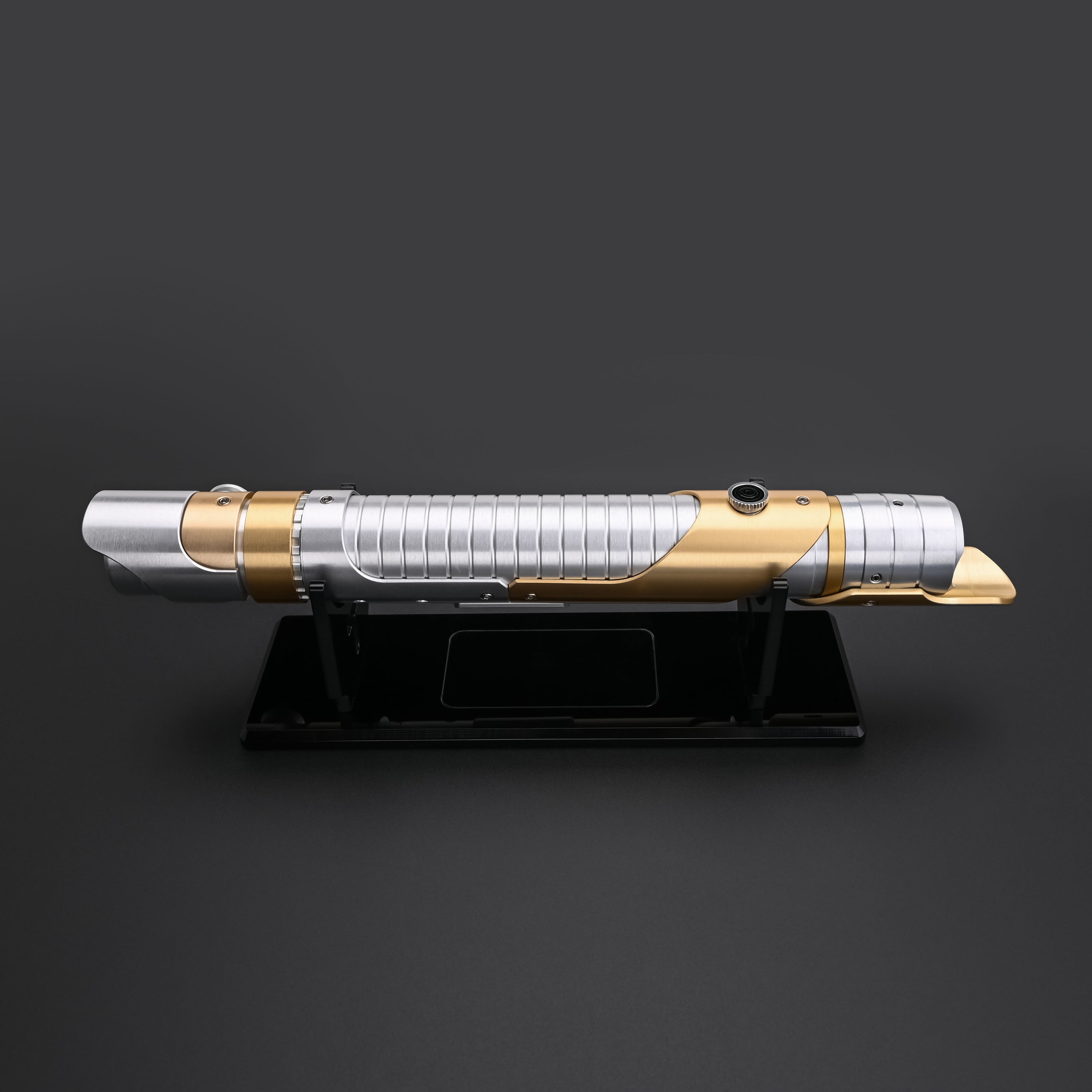 Skeleton Crew lightsaber hilt on a stand
