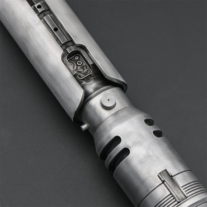 Partial view of Cal Kestis EP3 Weathered lightsaber 