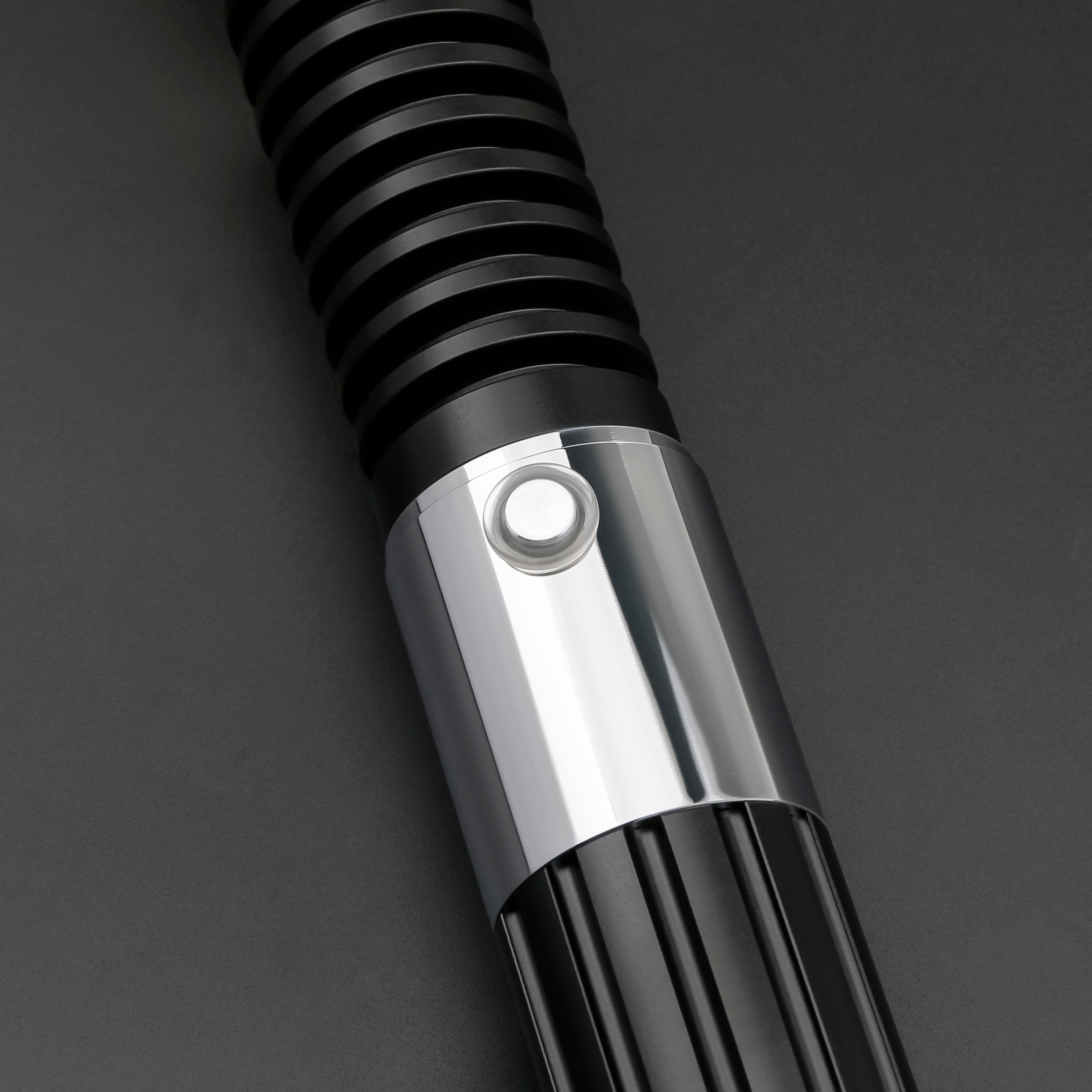 Obi-Wan SE lightsaber button