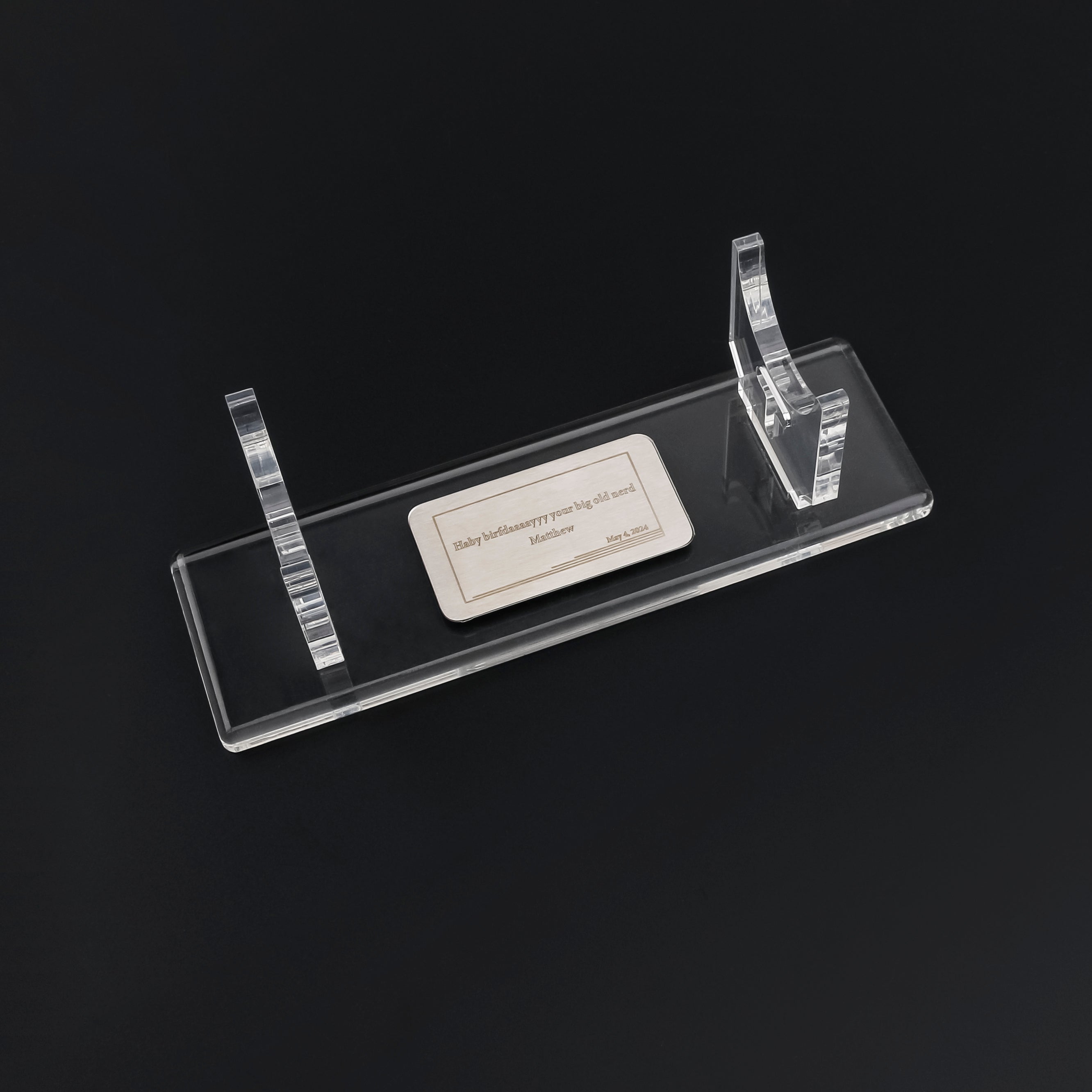 Lightsaber nameplate on display stand 