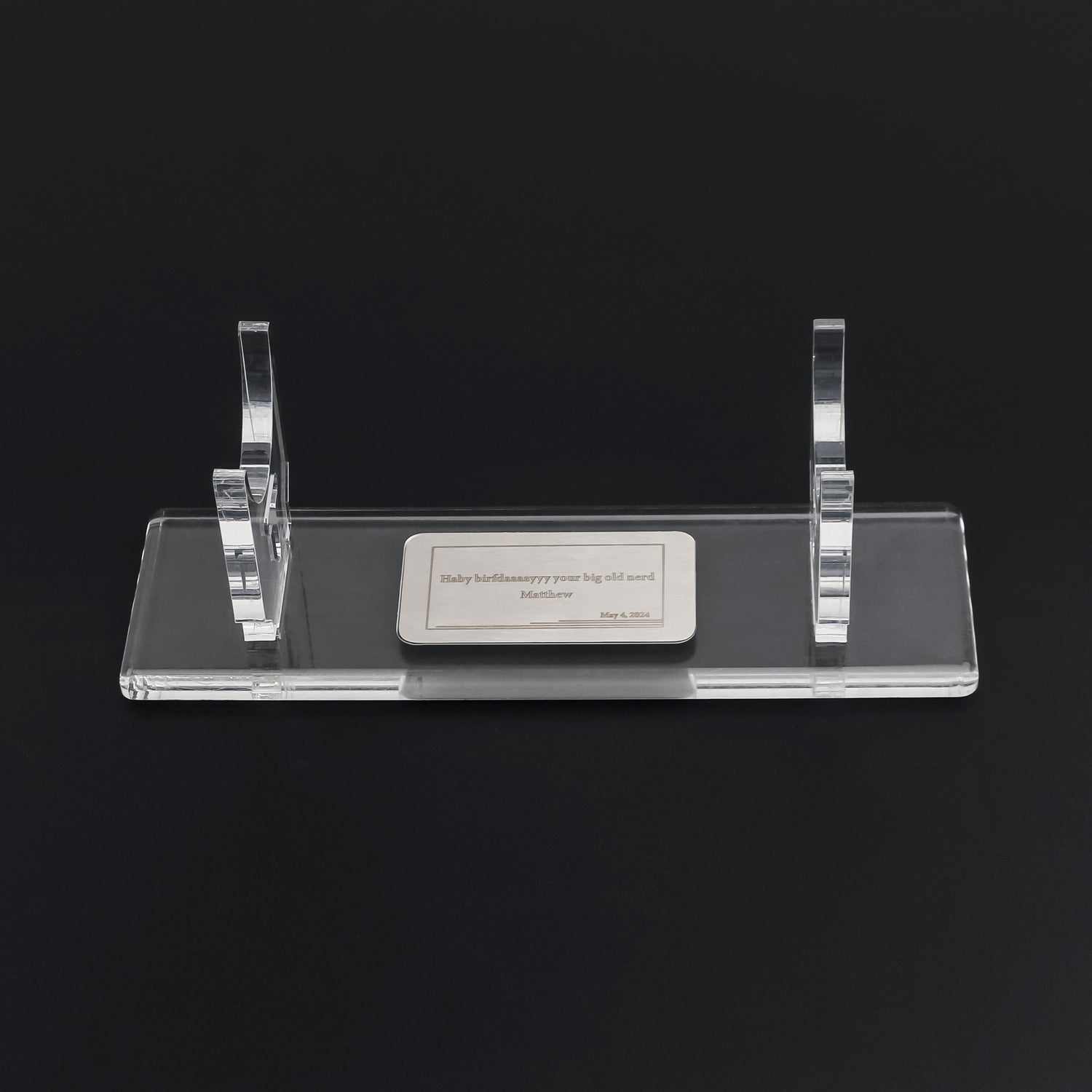 Lightsaber nameplate on display stand 